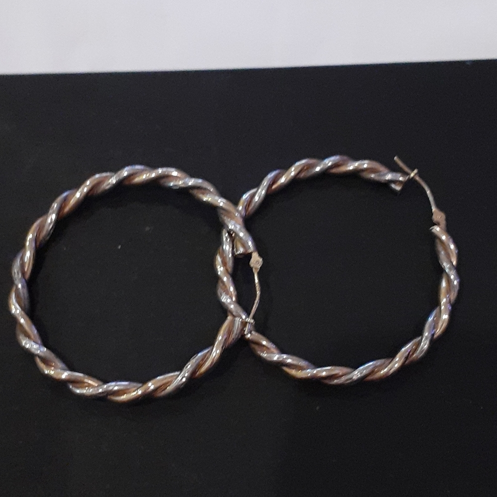 Beautiful 925 with 1/15 14k gold hoops.